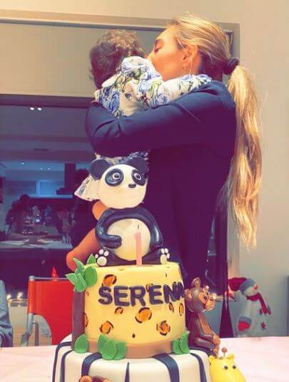 Alexandra-Sofia Kalouli celebrating the first birthday of her daughter Serina Ansarifard.